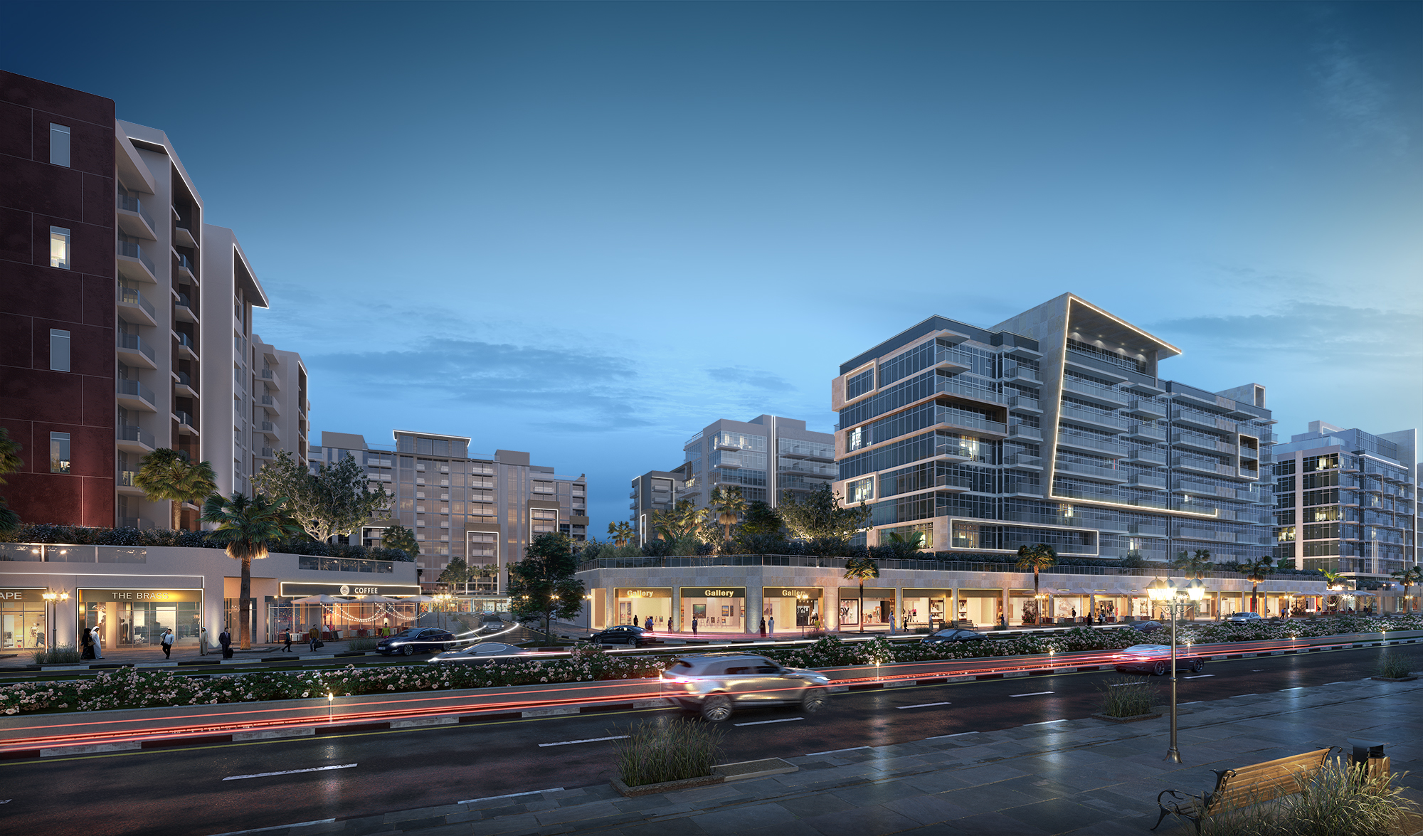 Azizi Riviera retail boulevard with illuminated storefronts and modern architecture at dusk